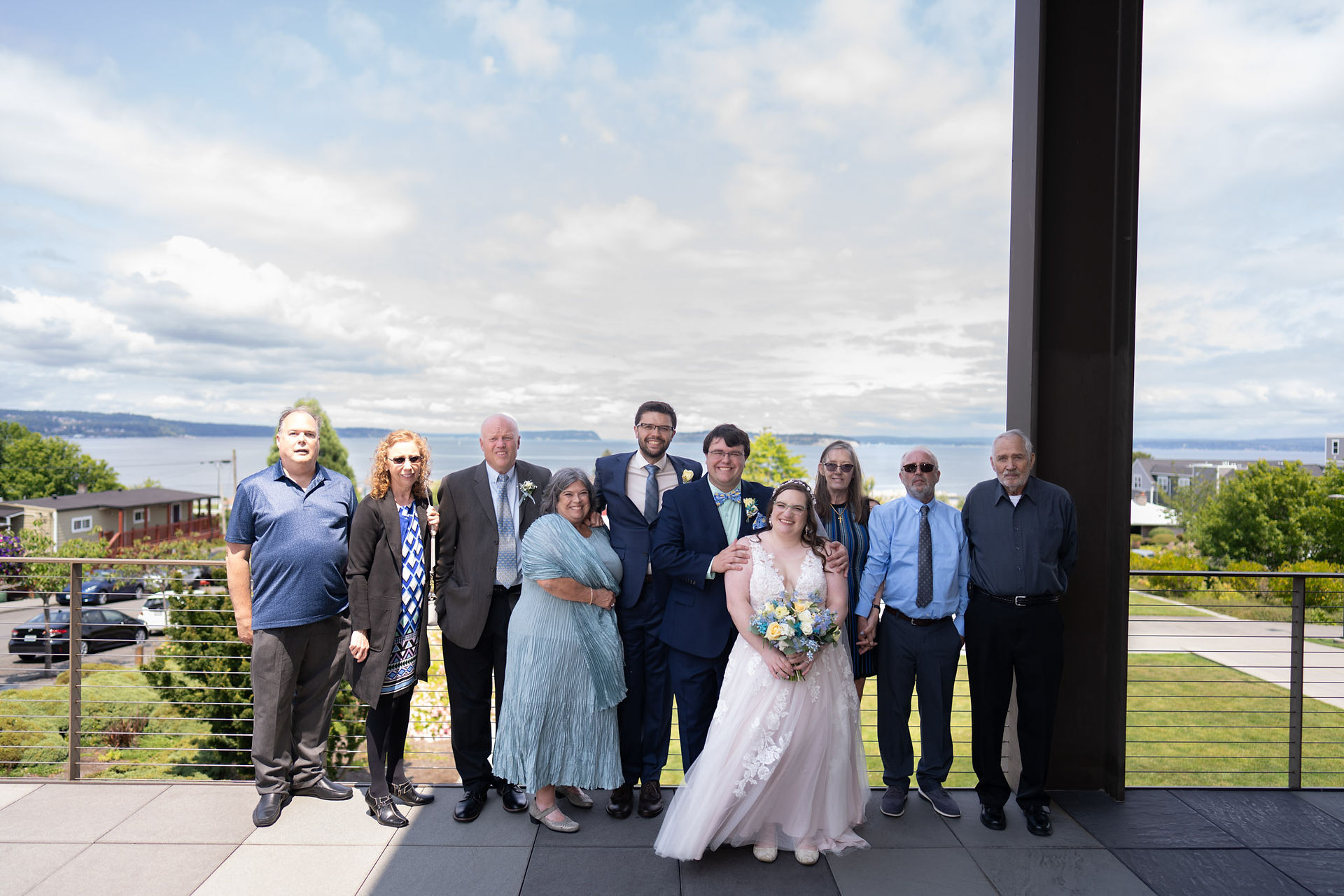 Wedding group photo with ocean view