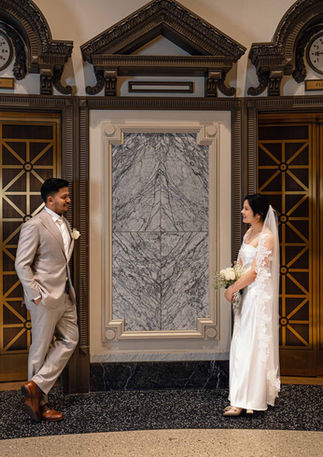 Wedding rings and bouquet detail at modern Seattle courthouse wedding.