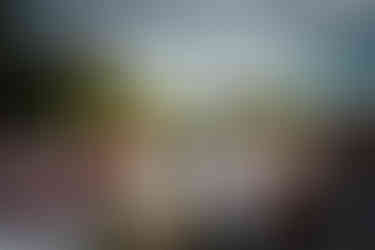 Couple embraces at outdoor wedding ceremony, Olympic View Wedding Estates.