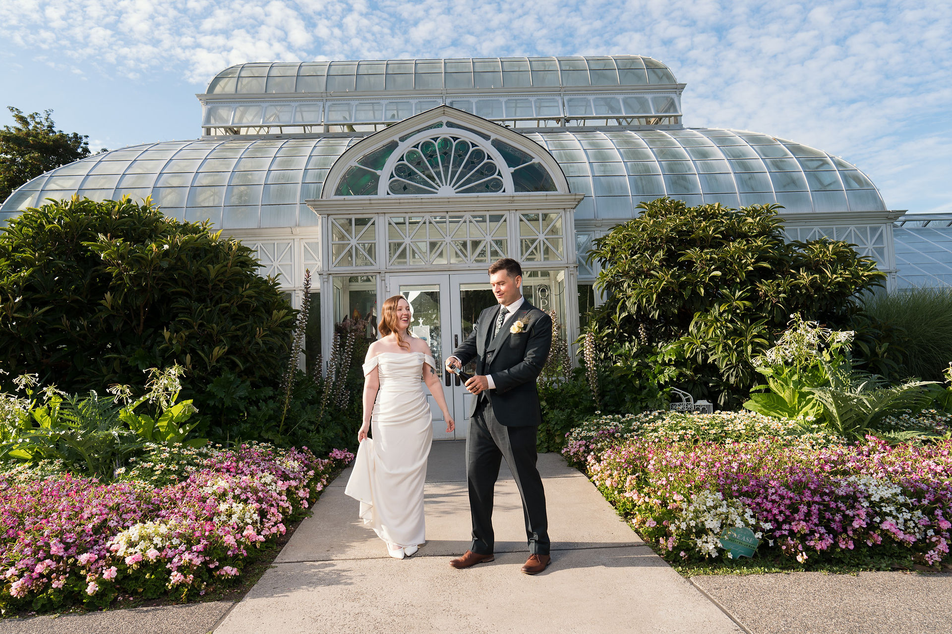 Couple outside Volunteer Park Conservatory in Seattle.