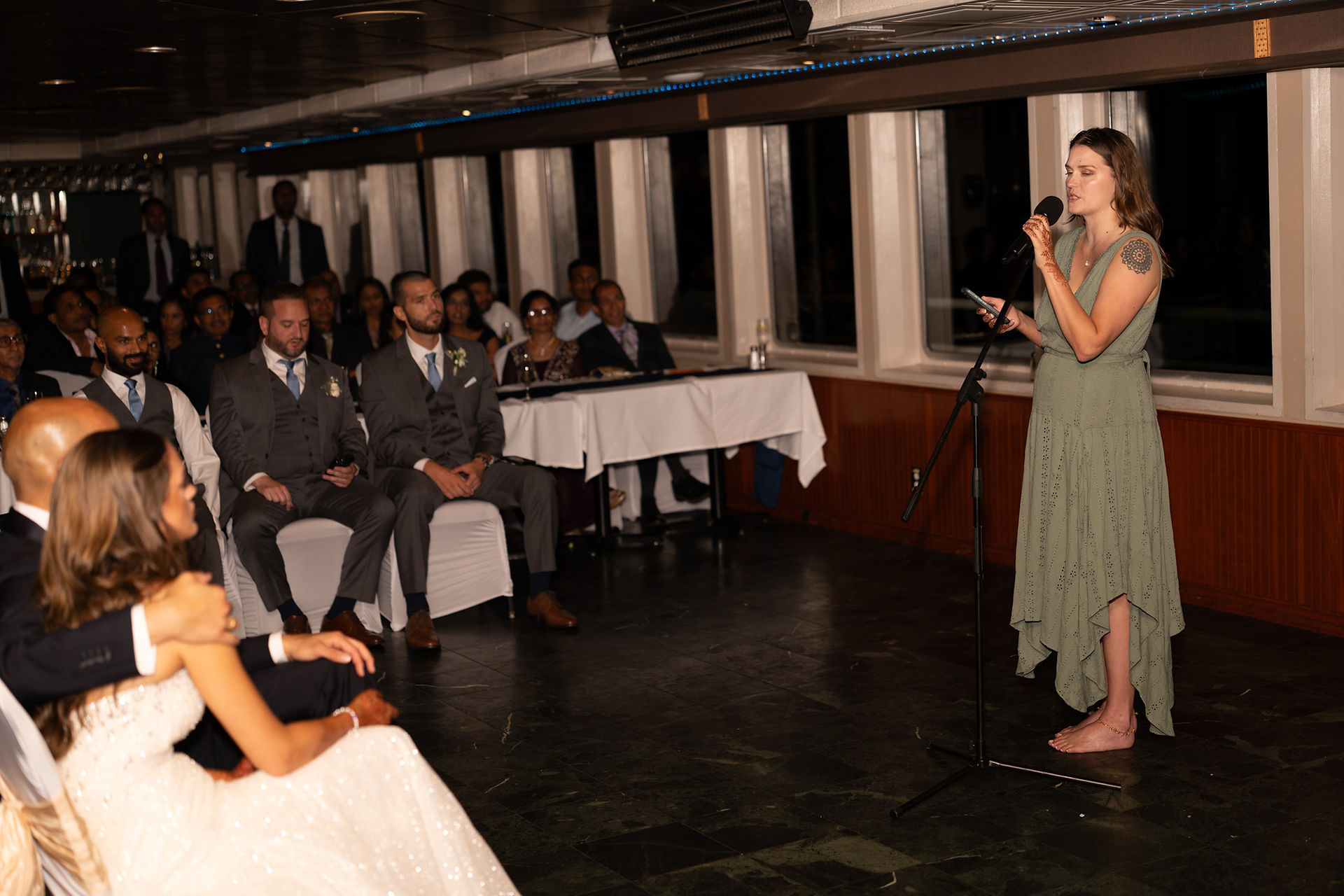 Woman giving a wedding toast captured by a WA Wedding Photographer