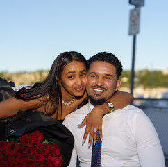 Happy couple embraces after proposal, Seattle