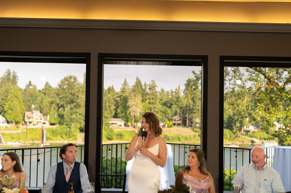 Woman in white dress speaks at wedding, The Foundry, Lake Oswego.