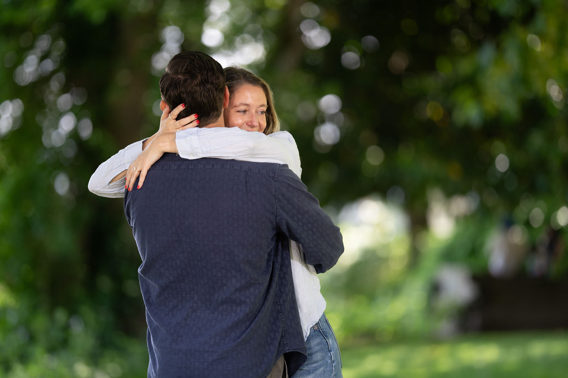Happy couple embracing outdoors