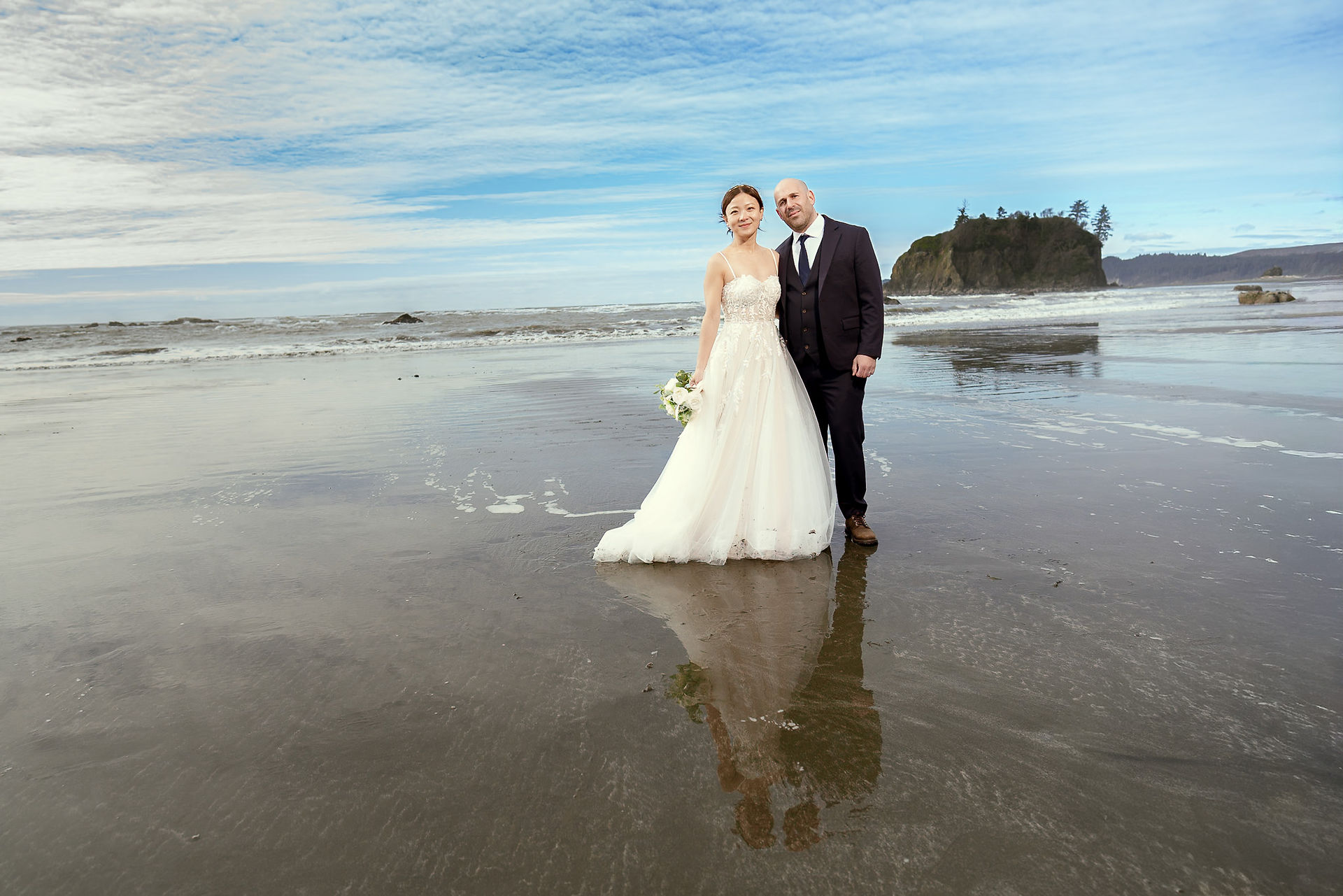 Couple eloping on a beach in Olympic National Park