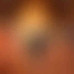 Couple walks down grand chapel aisle during wedding ceremony.