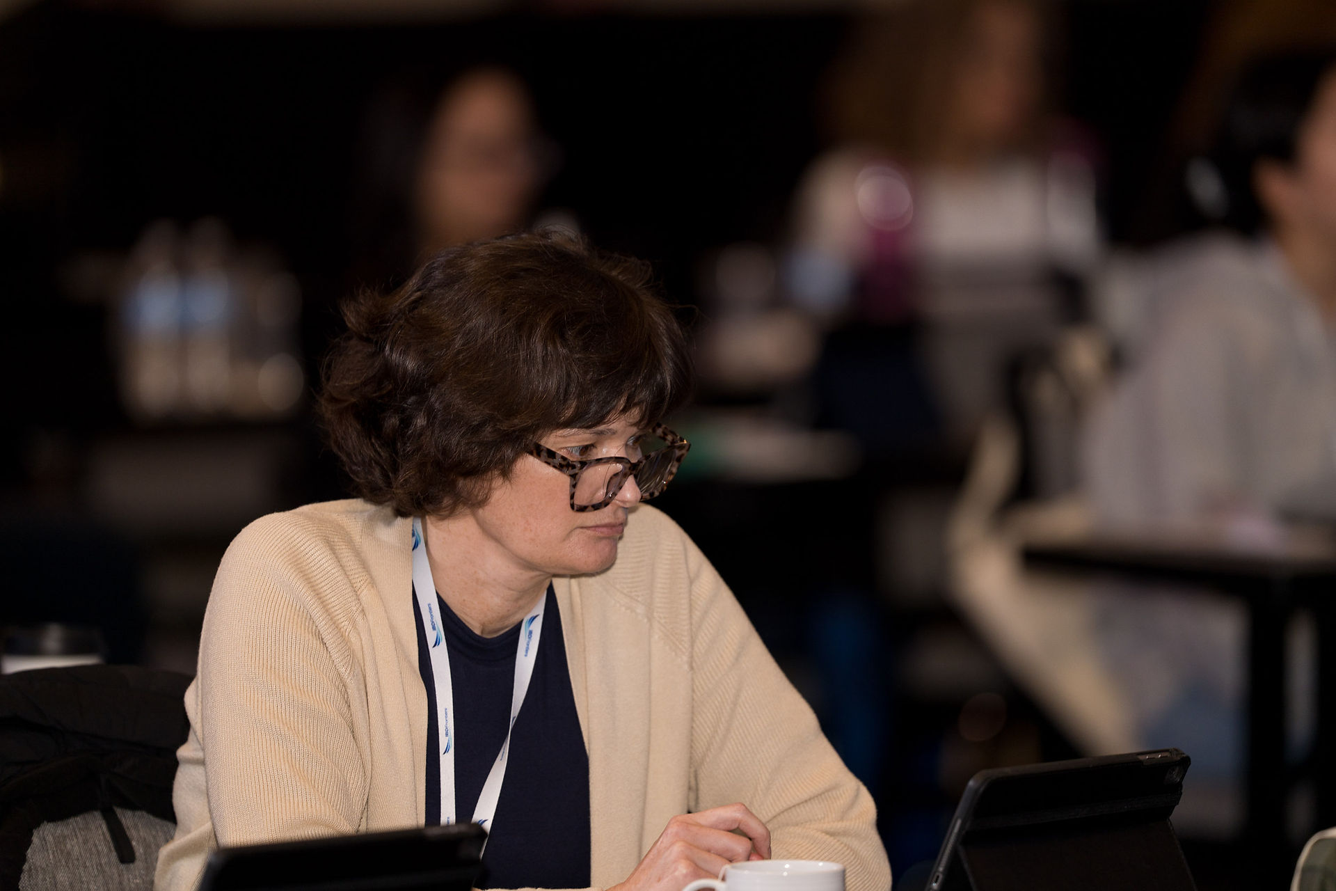 Woman attendee at Seattle event symposium