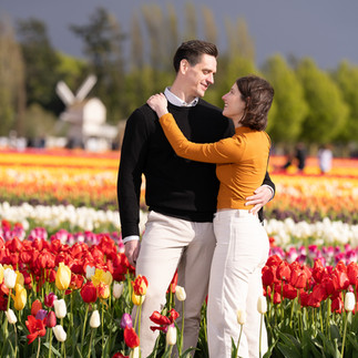 Couple embracing in tulip field at Skagit Tulip Festival
