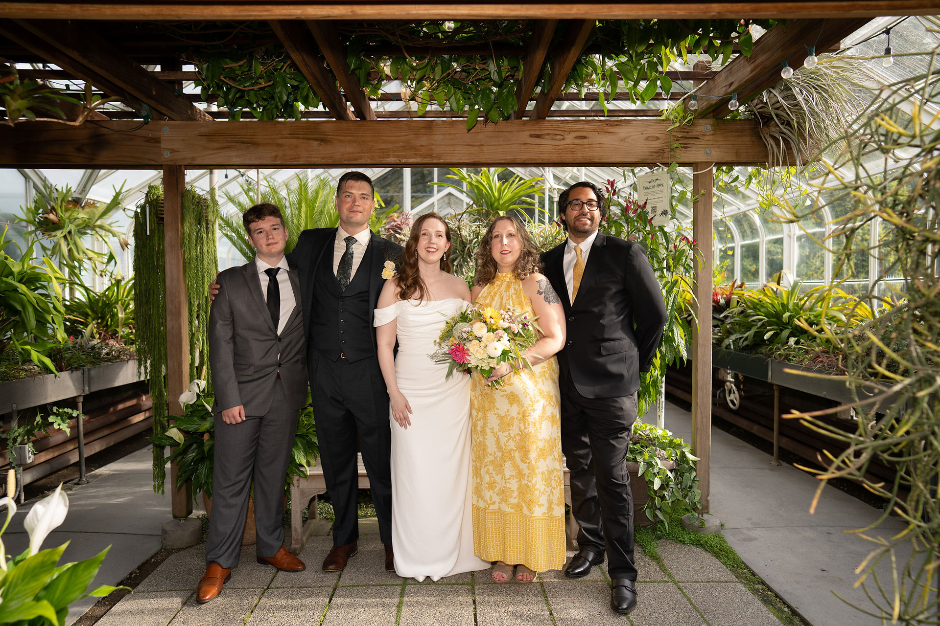 Wedding party at Volunteer Park Conservatory in Seattle.