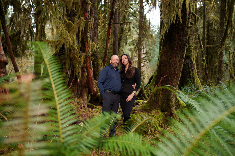 Couple in a lush, mossy forest, Olympic National Park Elopement.