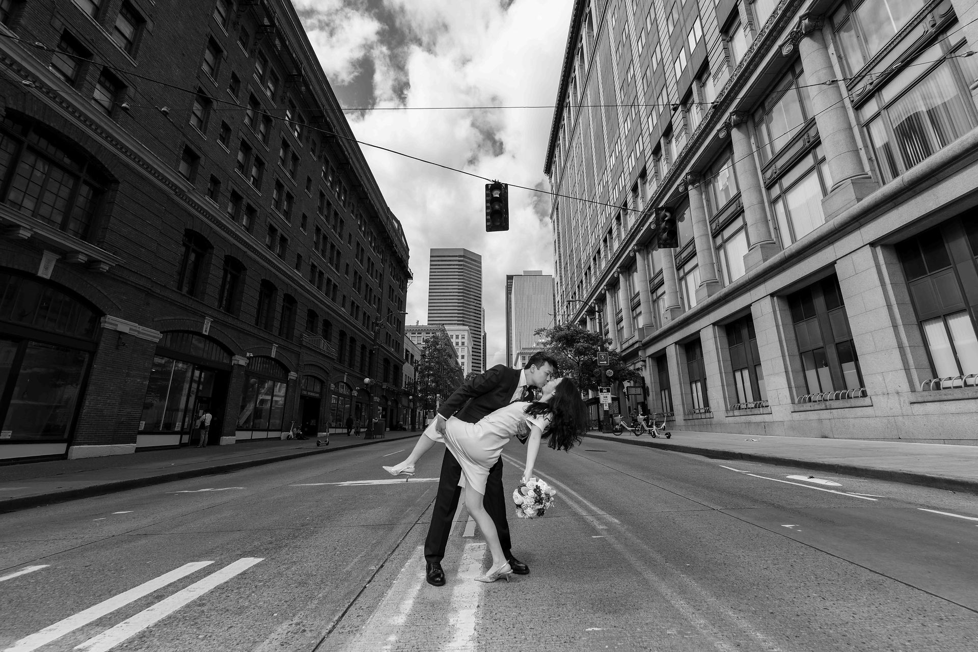 Romantic couple kissing on city street