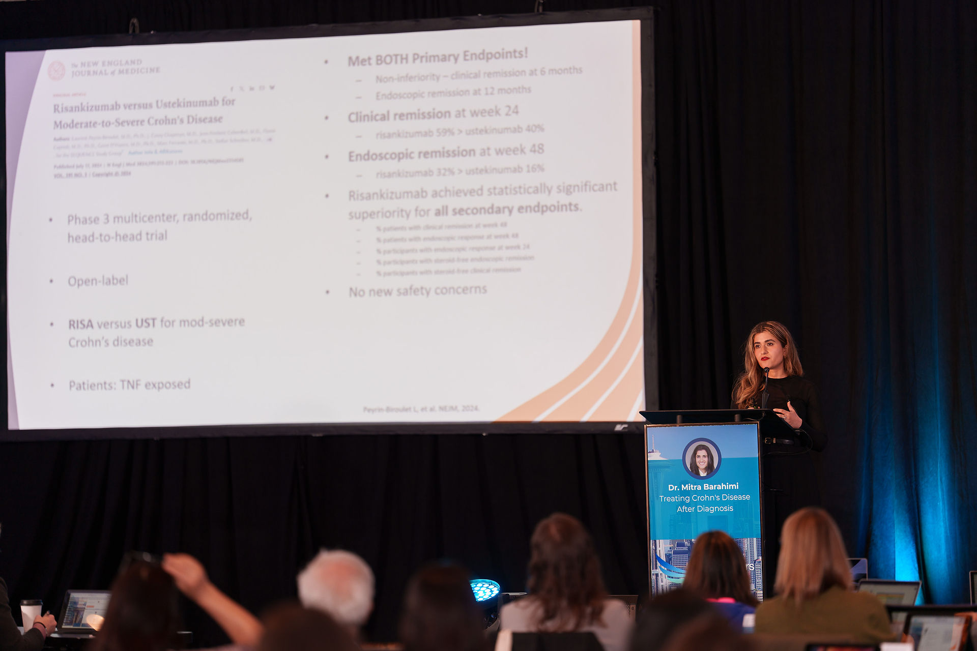 Woman presenting at a symposium, Seattle event photography