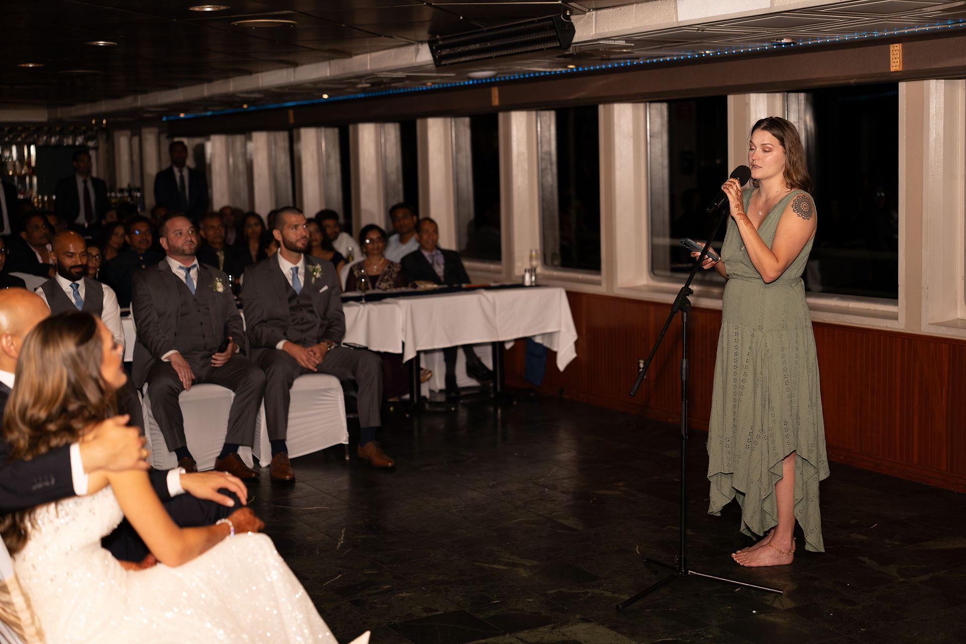 Maid of honor gives a toast at a WA wedding reception.
