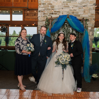 Wedding couple and family at Gold Mountain Golf Club