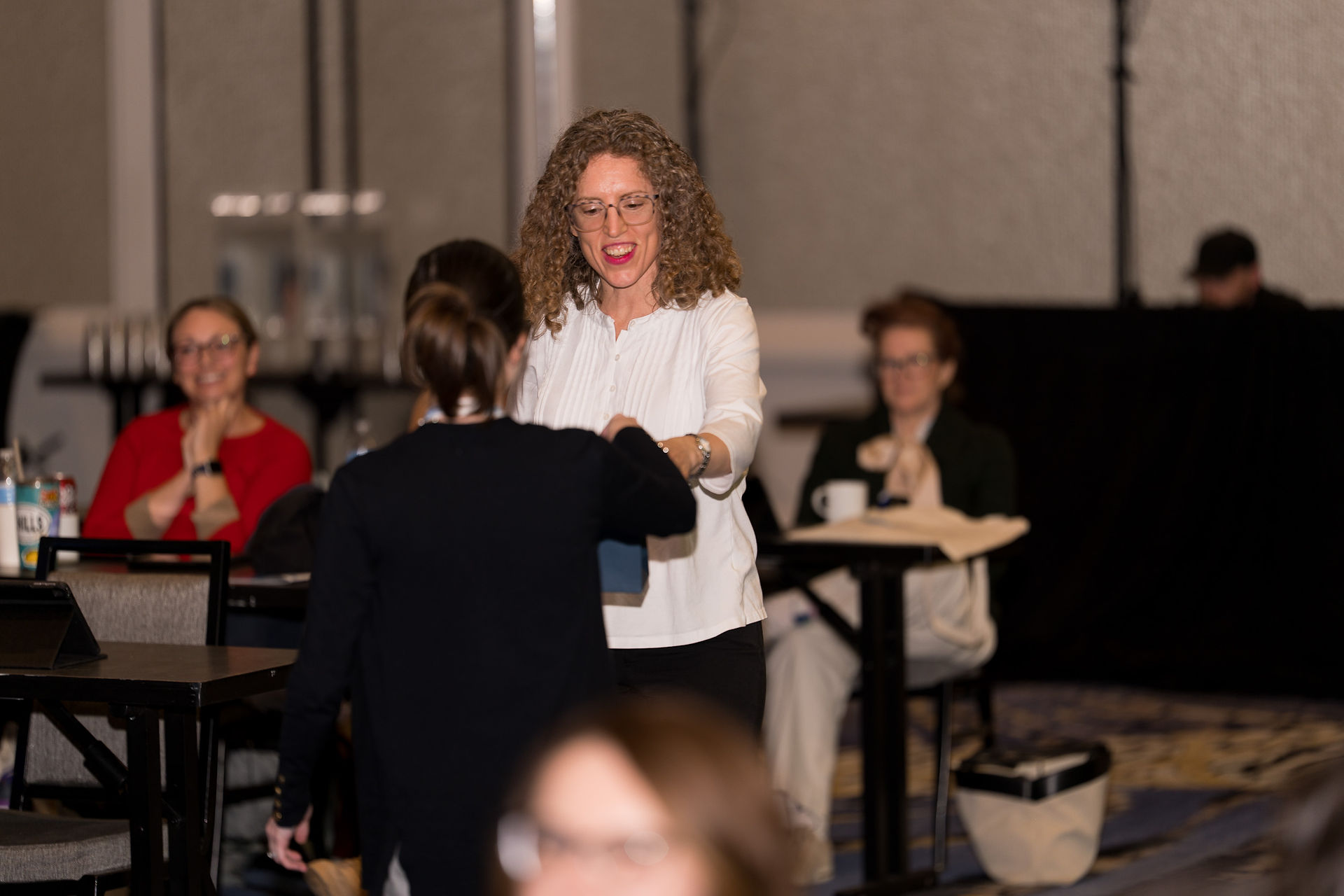 Woman presenting at a Seattle event