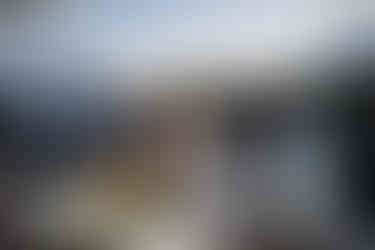 Celebrating couple and guests at an intimate outdoor evening farm wedding.