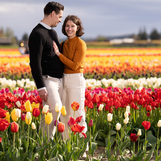 Couple in colorful tulips at Skagit Tulip Festival