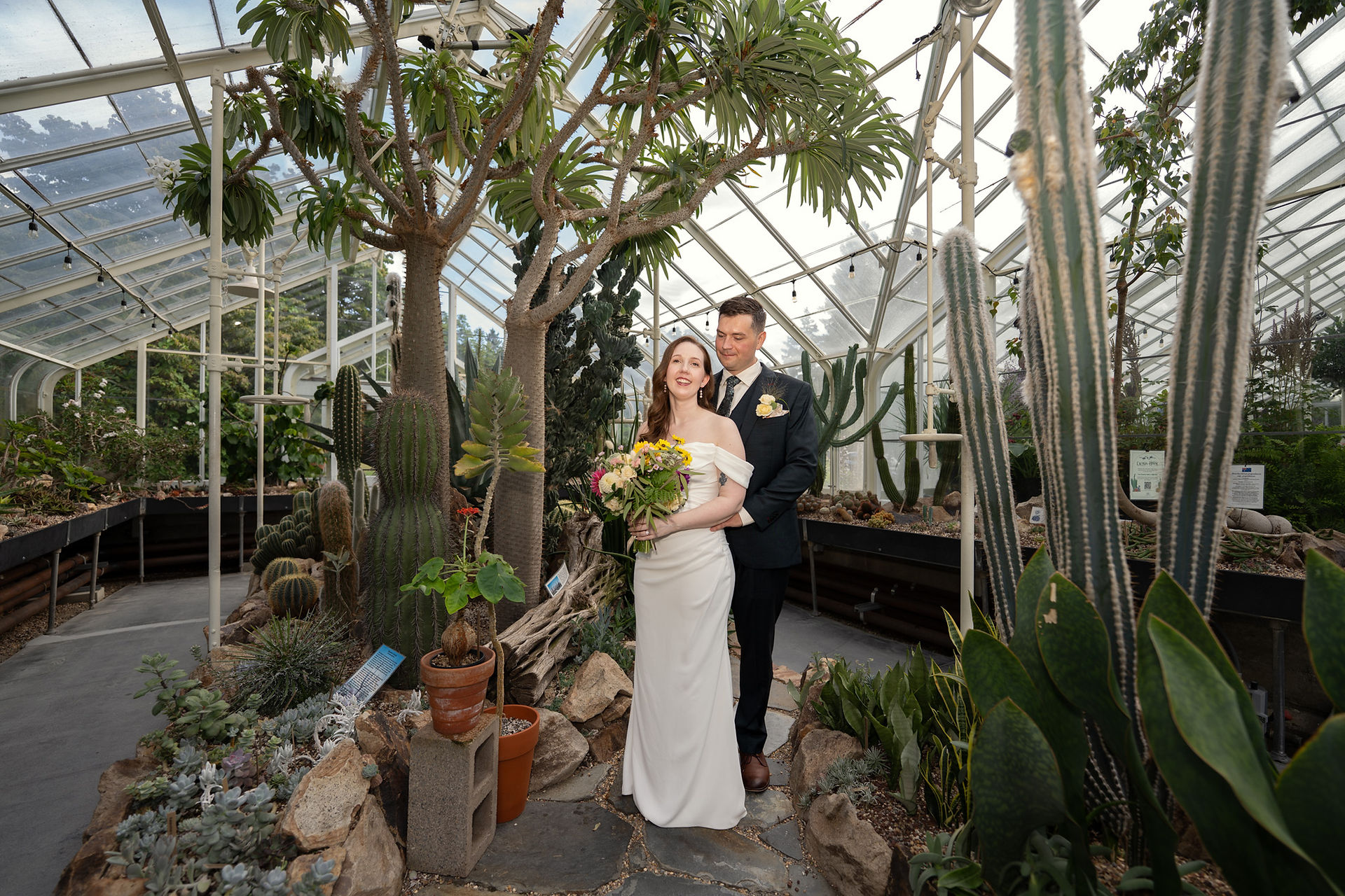 Wedding couple at Volunteer Park Conservatory in Seattle.