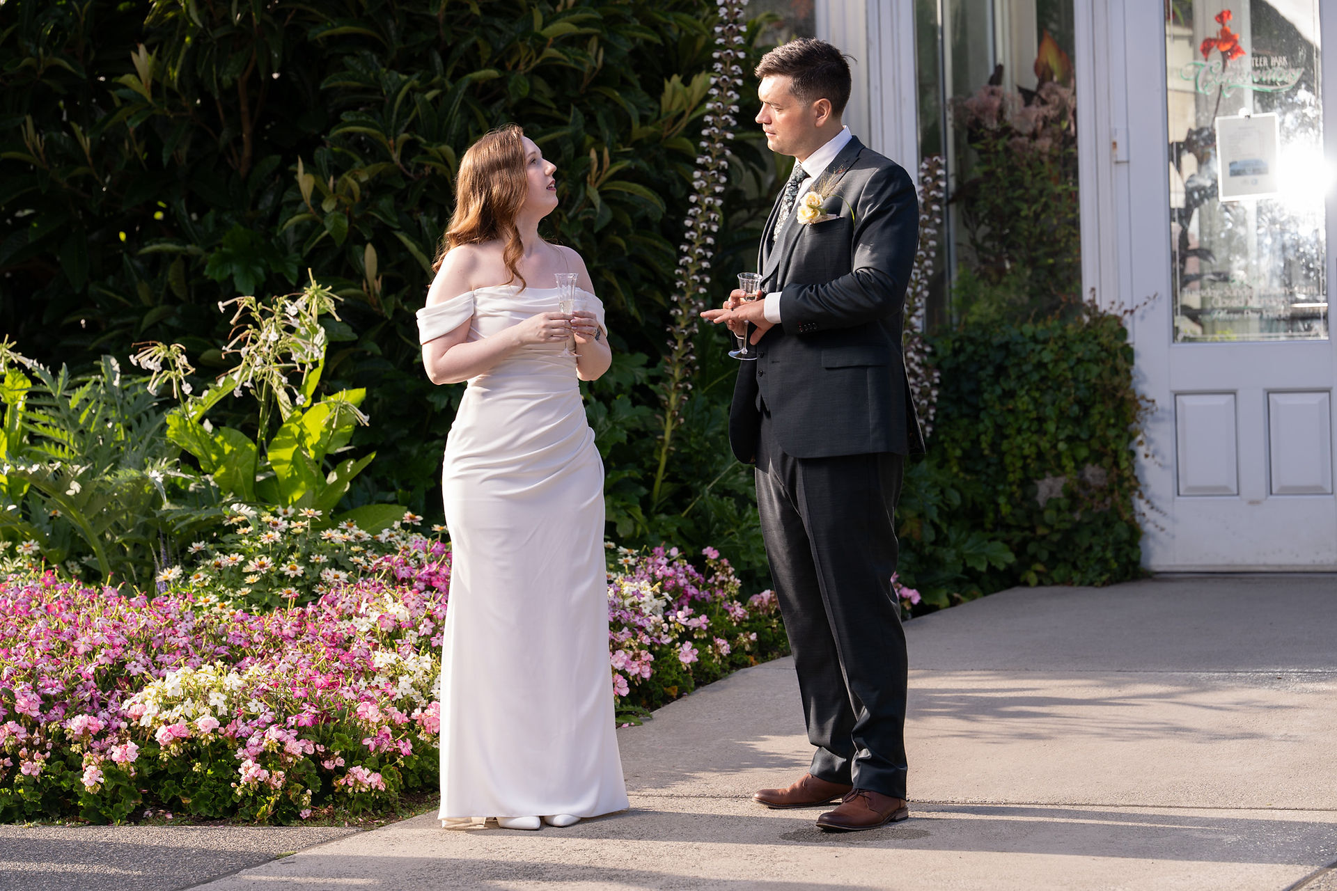 Bride and groom at Volunteer Park Conservatory in Seattle.