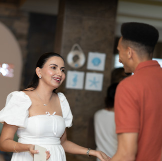 Smiling woman and man conversing