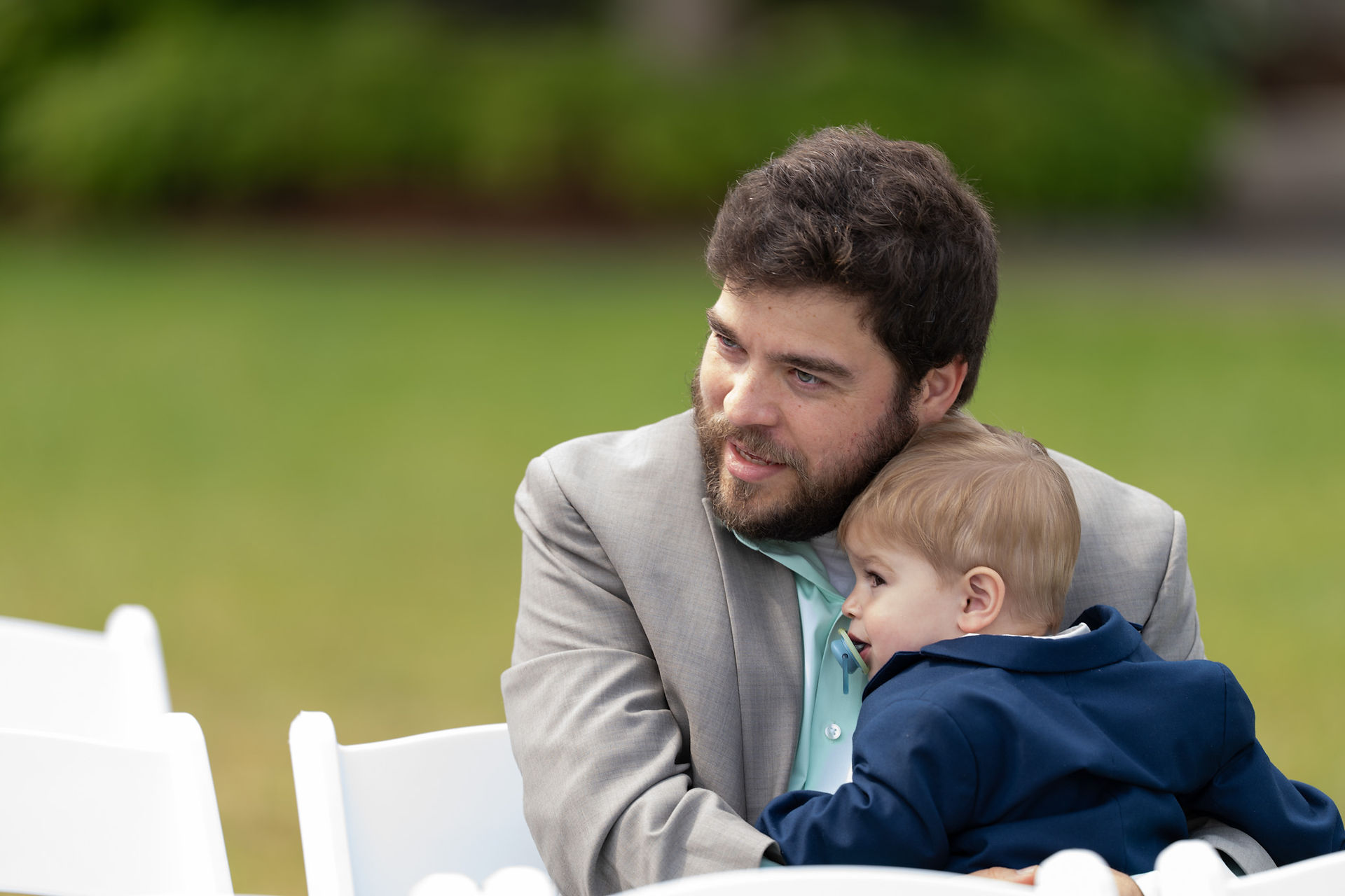 Man and toddler at wedding