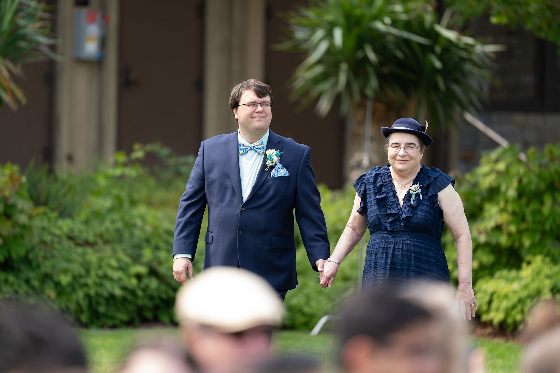 Happy couple holding hands, wedding day