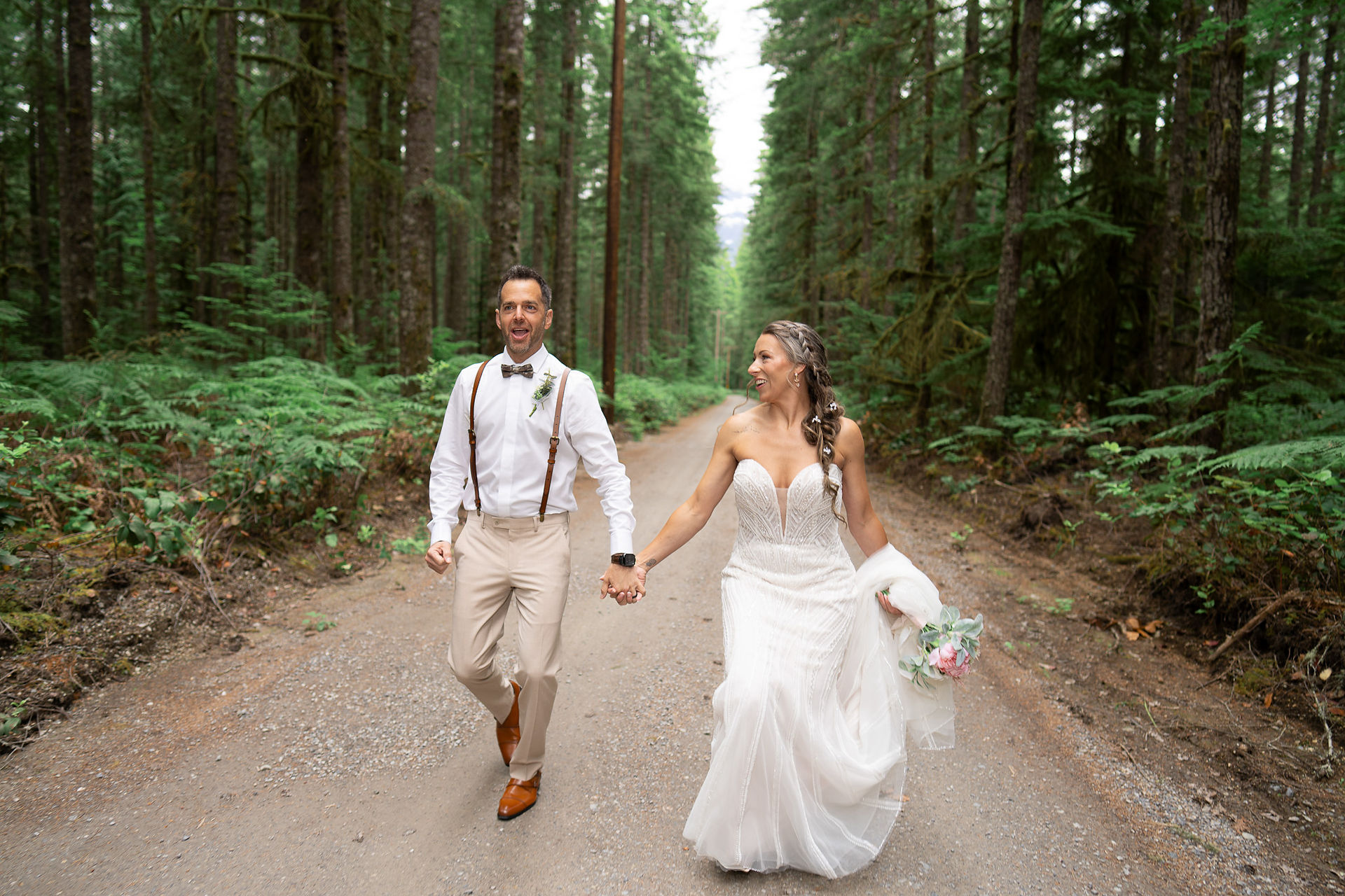 Bride and groom walking at Forest Creek Darrington WA