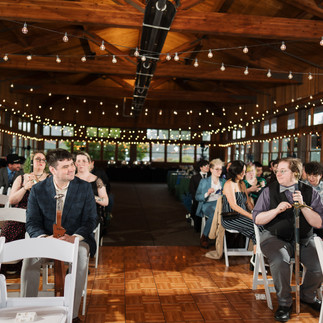 Wedding ceremony guests at Gold Mountain Golf Club.