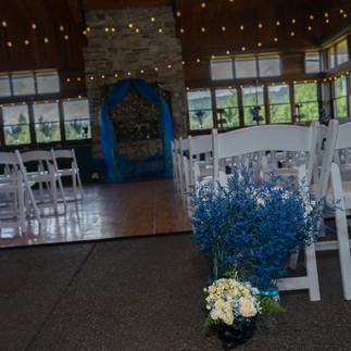 Gold Mountain Golf Club wedding ceremony, blue arch, white chairs