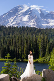 Bride in a white gown at a Mount Rainier elopement.