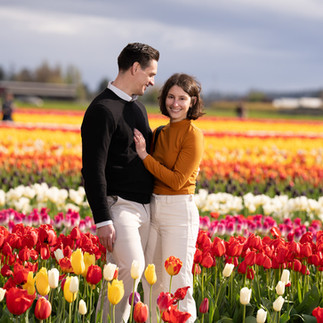Couple in colorful tulip field at Skagit Tulip Festival