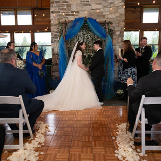 Bride and groom at their Gold Mountain Golf Club wedding ceremony