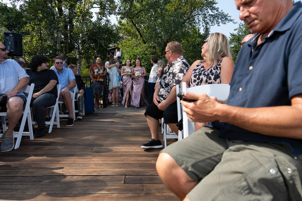 Wedding guests seated, watching ceremony at The Foundry, Lake Oswego Oregon.