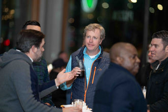 Men networking at corporate event