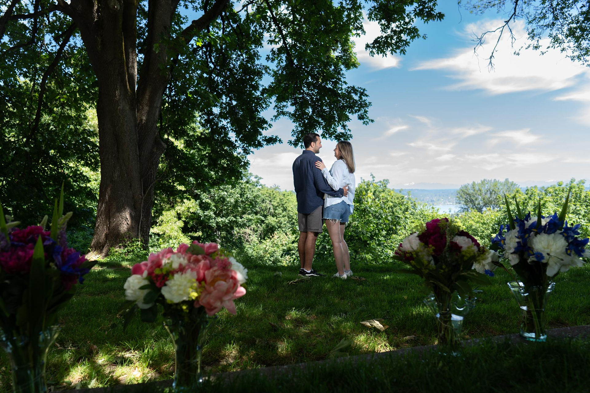 Romantic couple embracing, Green Lake proposal
