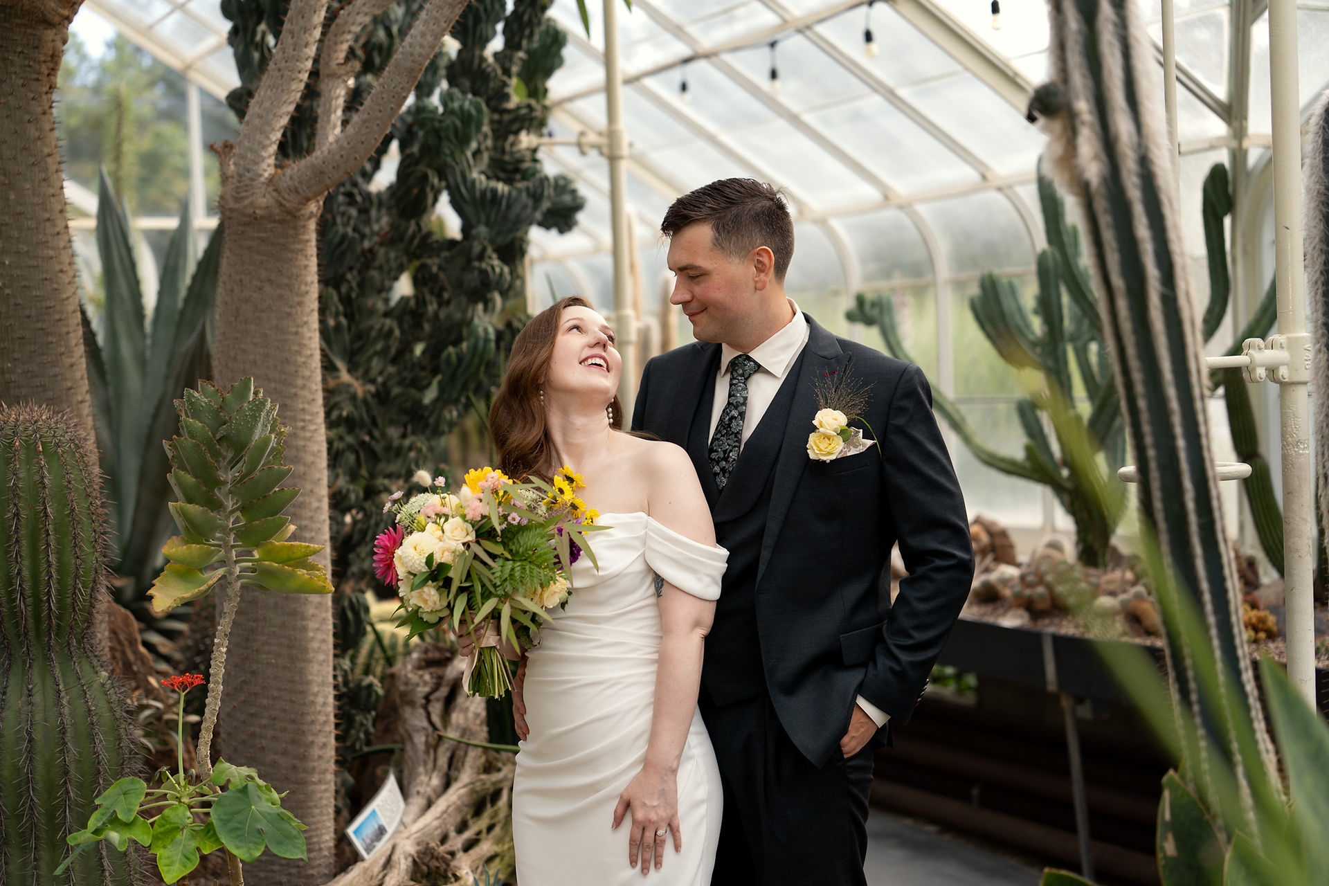 Wedding couple at Volunteer Park Conservatory in Seattle.