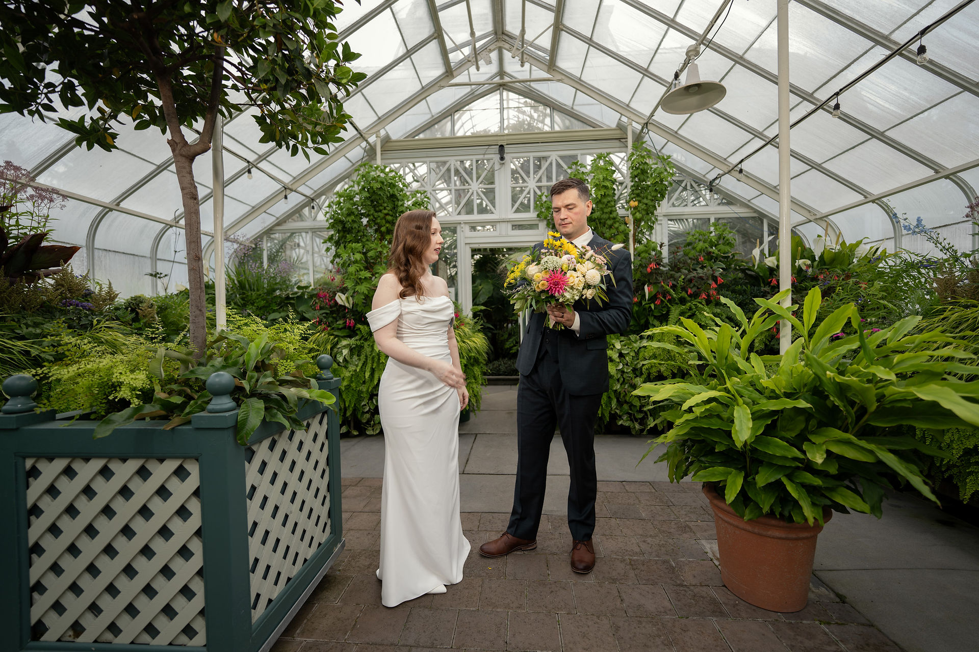 Couple eloping at Volunteer Park Conservatory in Seattle