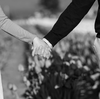 Couple holding hands at Skagit Tulip Festival