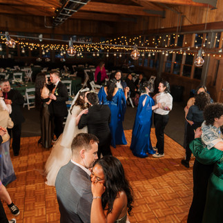Wedding guests dancing at Gold Mountain Golf Club Weddings