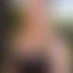 Smiling woman with long blonde hair