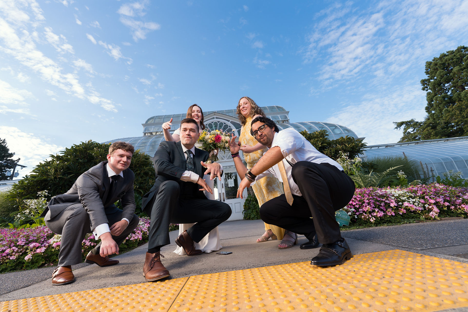Wedding party at Volunteer Park Conservatory in Seattle
