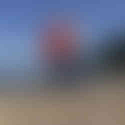 Jessica and Brian kissing at Meadowdale Beach Park