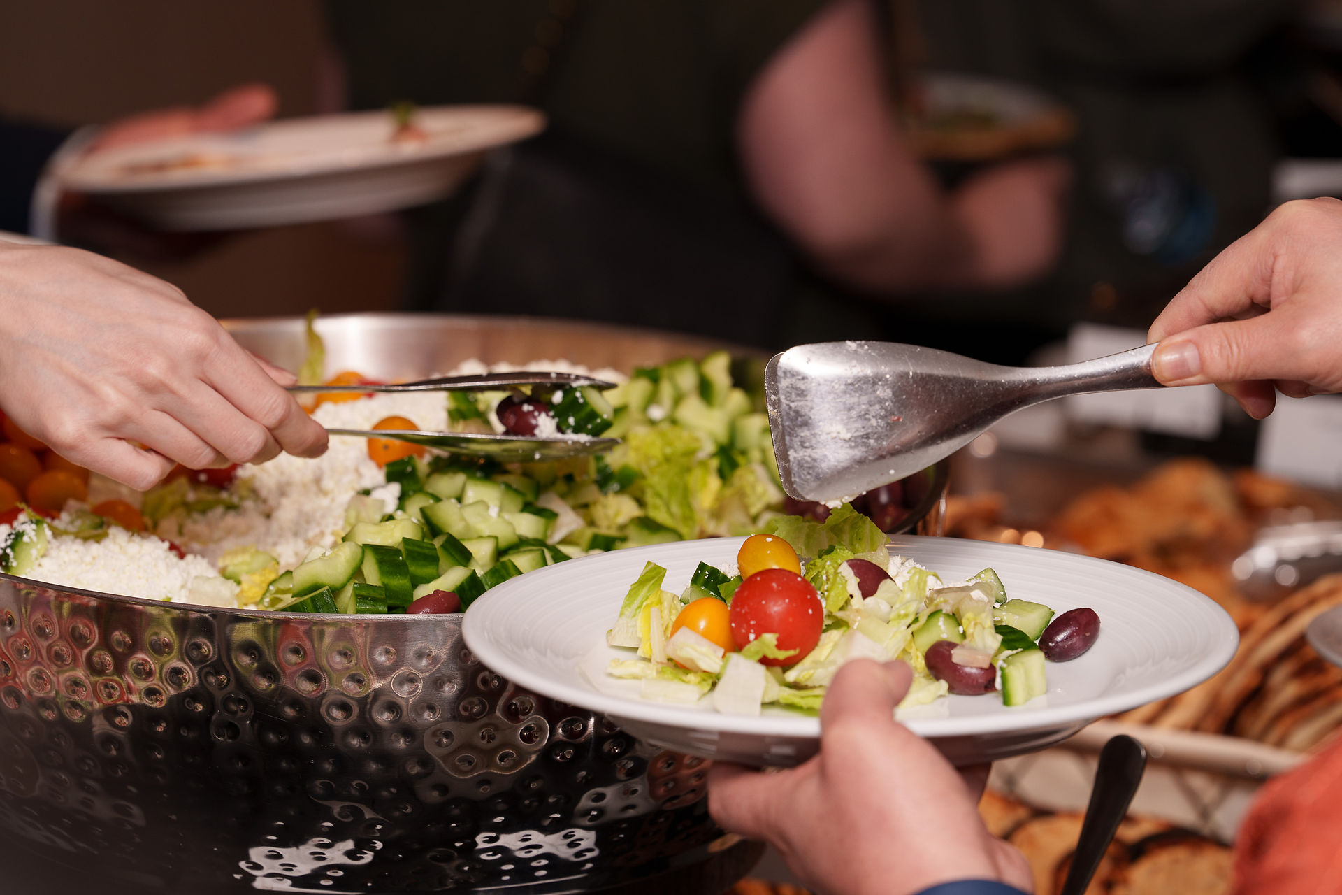 Fresh salad being served at a Seattle event