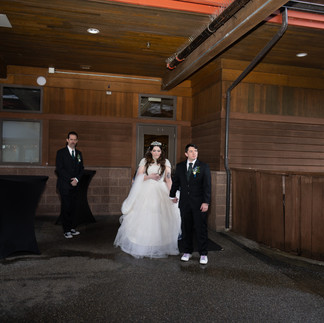 Bride and groom in sneakers at a Gold Mountain Golf Club wedding