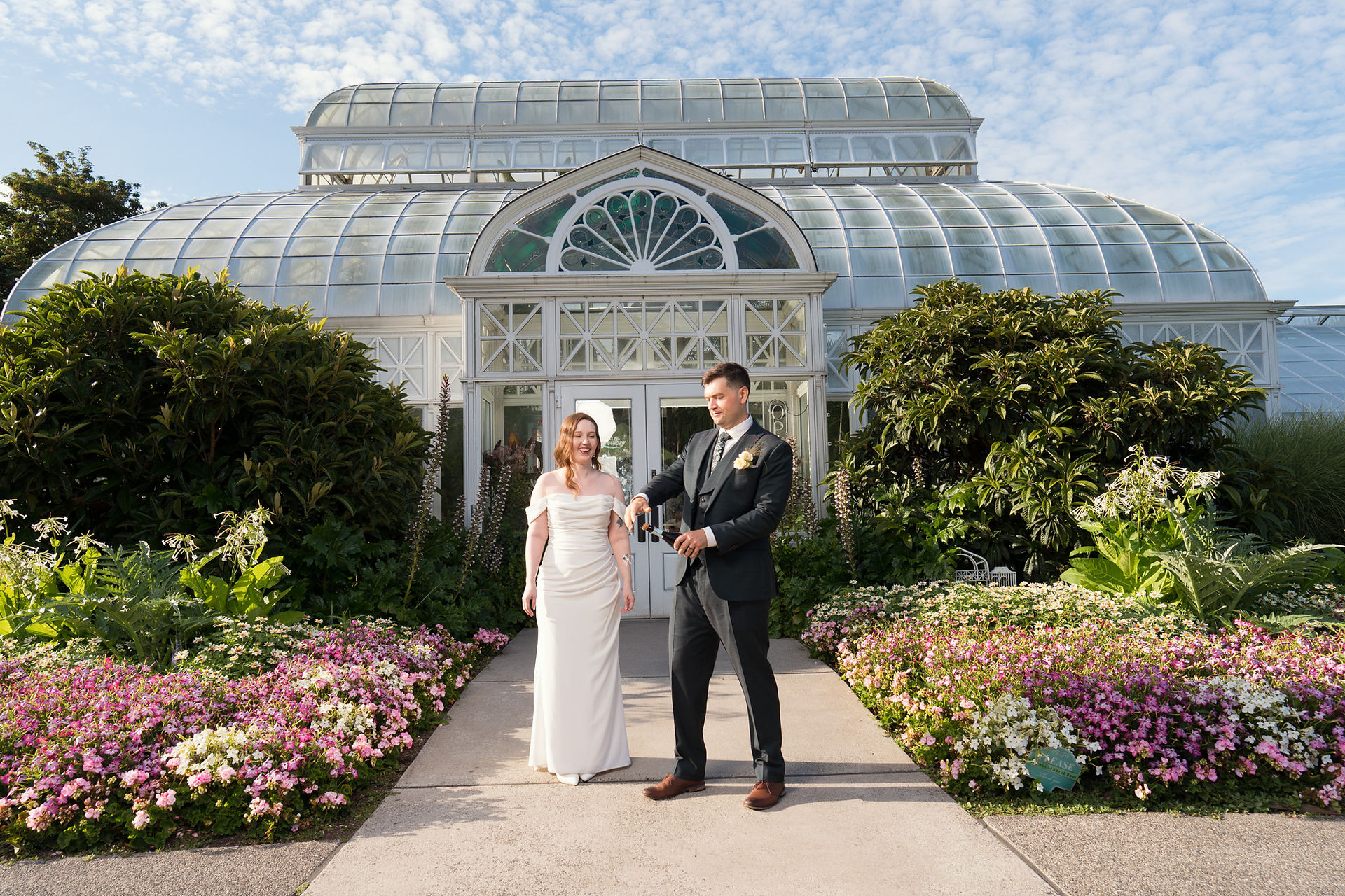 Couple outside Volunteer Park Conservatory in Seattle.