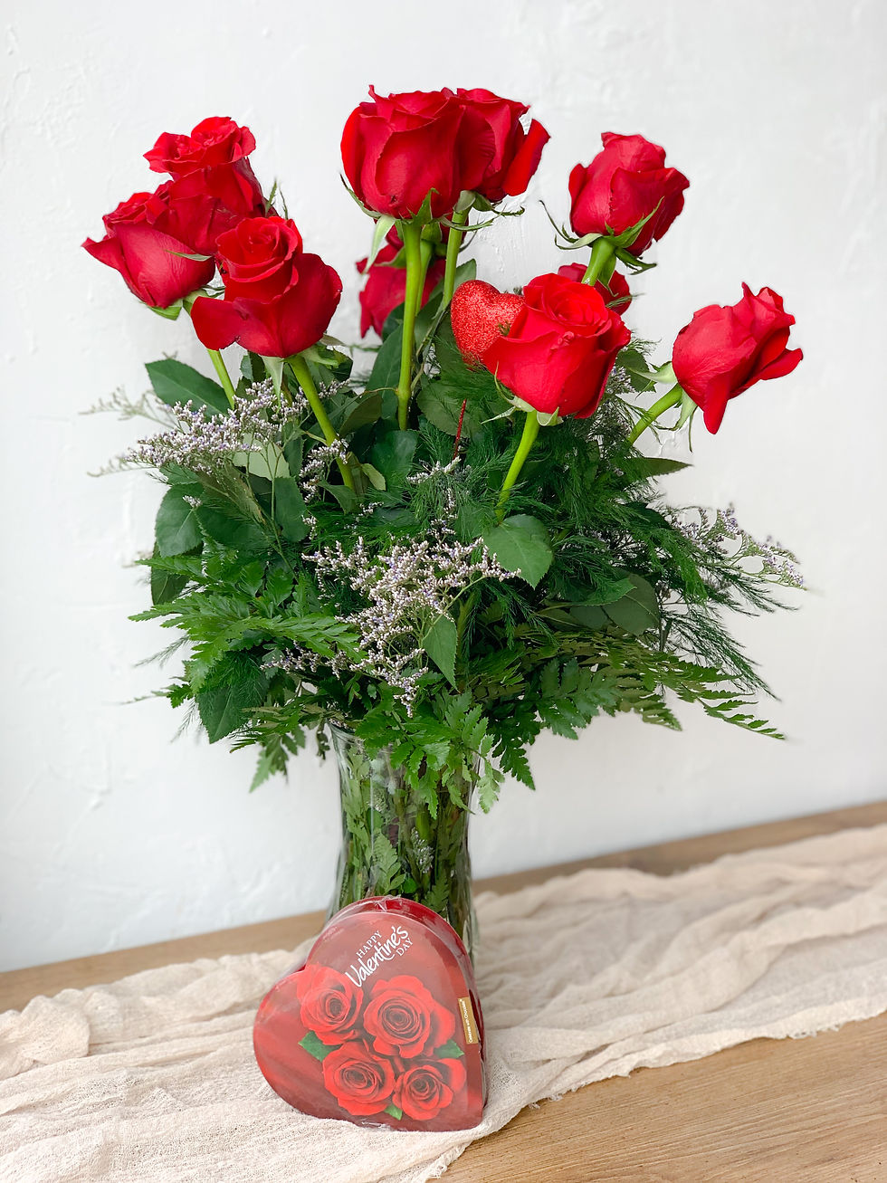 Dozen roses arranged in a vase