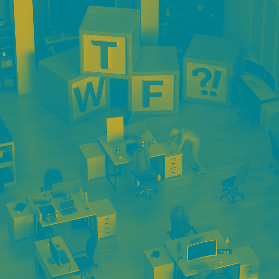 Office with large blocks spelling "T", "W", "F", and "?!" A person leans on a desk. Computers and chairs in the background.