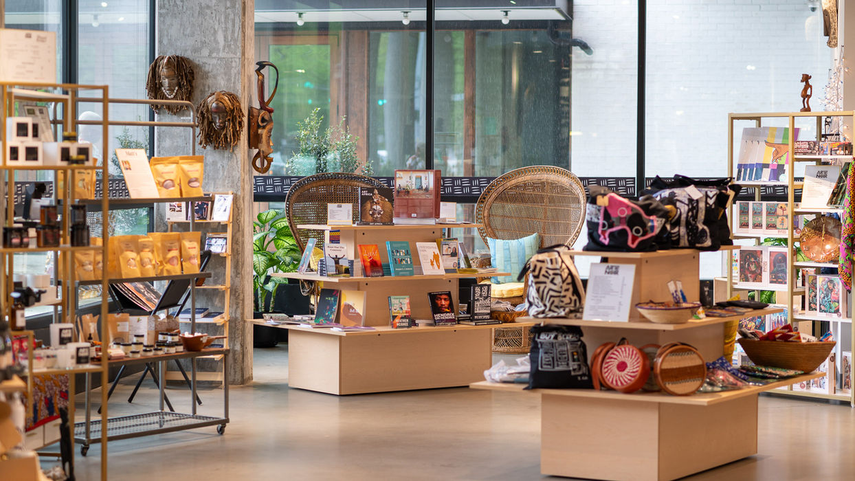 Artisan crafts and books displayed in a shop