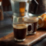 two cups of black coffee