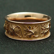 Yellow gold wedding band with grapes
